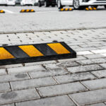 instalación de topes para estacionamiento